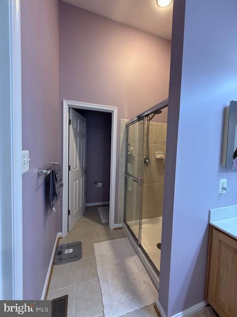 11777 Skylark Road Clarksburg, MD 20871 - Photo 48 of 75 a bathroom with a glass door shower and a sink