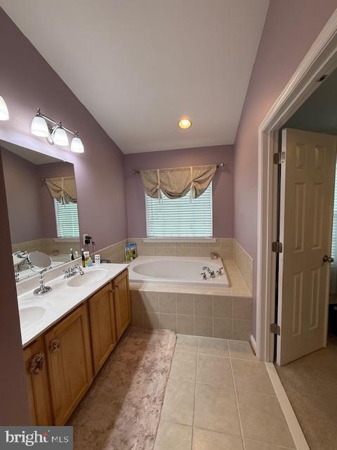11777 Skylark Road Clarksburg, MD 20871 - Photo 52 of 75 a bathroom with a bathtub sink and mirror