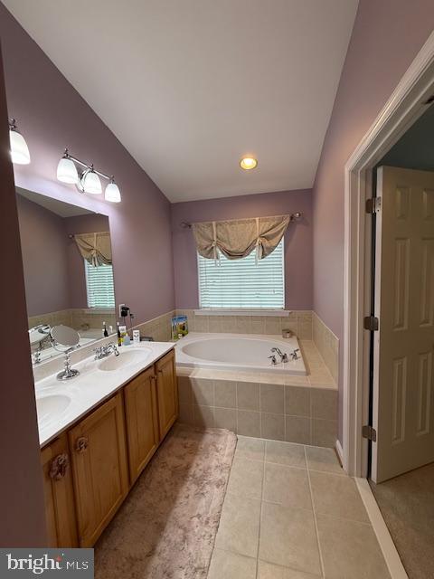 11777 Skylark Road Clarksburg, MD 20871 - Photo 53 of 75 a bathroom with a tub sink double vanity granite and shower