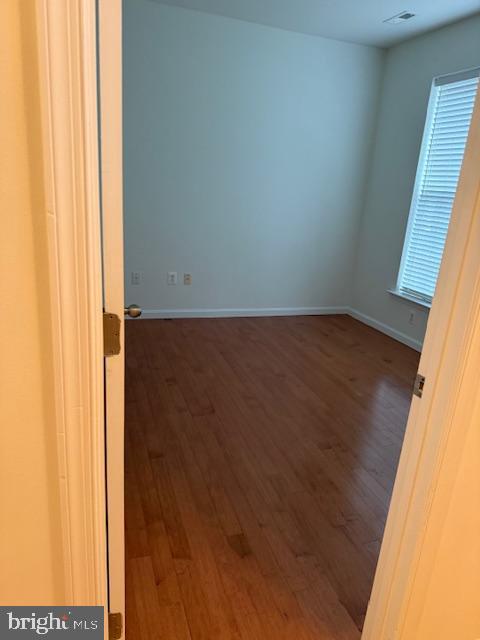 11777 Skylark Road Clarksburg, MD 20871 - Photo 59 of 75 an empty room with wooden floor