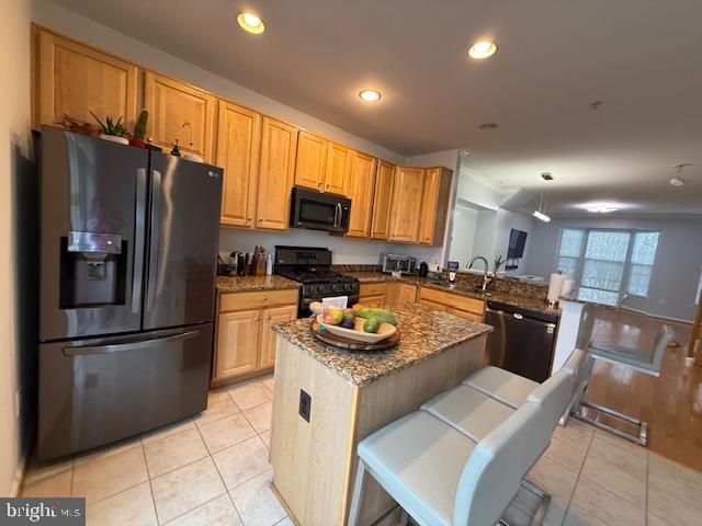 11777 Skylark Road Clarksburg, MD 20871 - Photo 8 of 75 a kitchen with a refrigerator a microwave a sink and a counter top space