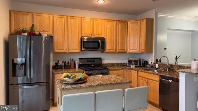 11777 Skylark Road Clarksburg, MD 20871 - Photo 9 of 75 a kitchen with stainless steel appliances granite countertop a refrigerator and a stove top oven