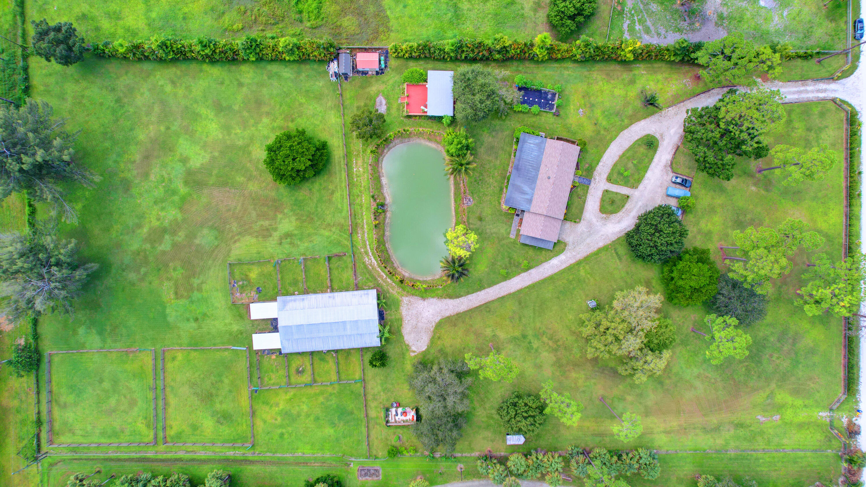 13598 N Road Loxahatchee Groves, FL 33470 - Photo 11 of 87 11_house air (11)