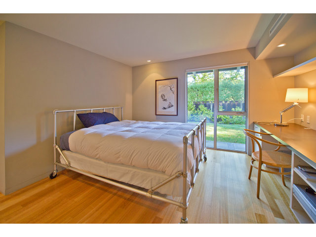 1850 Brookvale Road Hillsborough, CA 94010 - Photo 12 of 24 a bedroom with a bed and a large window
