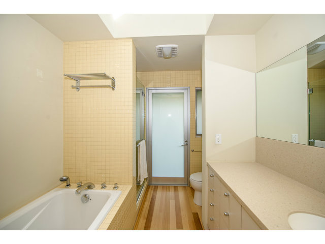 1850 Brookvale Road Hillsborough, CA 94010 - Photo 14 of 24 a bathroom with a sink and a mirror