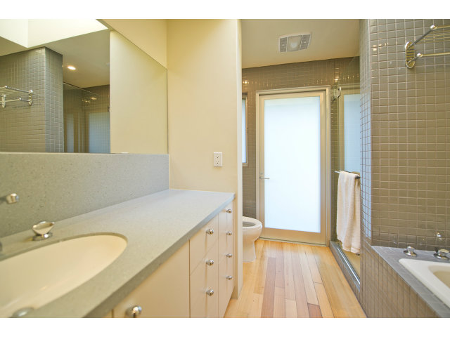 1850 Brookvale Road Hillsborough, CA 94010 - Photo 18 of 24 a bathroom with a sink and a mirror