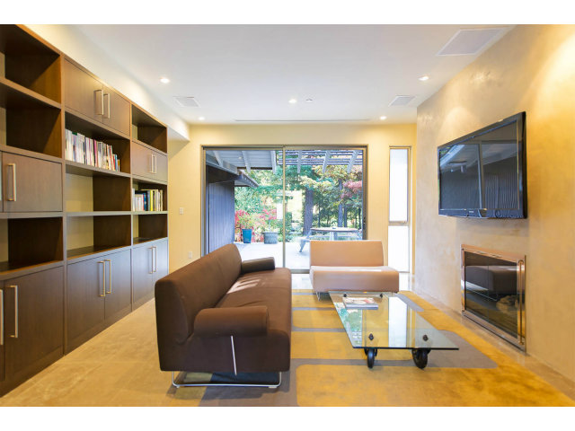1850 Brookvale Road Hillsborough, CA 94010 - Photo 3 of 24 a living room with furniture window and a flat screen tv