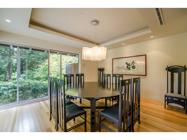 1850 Brookvale Road Hillsborough, CA 94010 - Photo 4 of 24 a view of a dining room with furniture large window and wooden floor