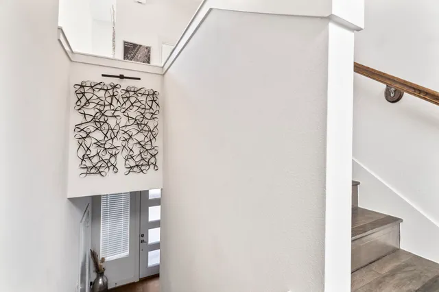 a view of front door with stairs