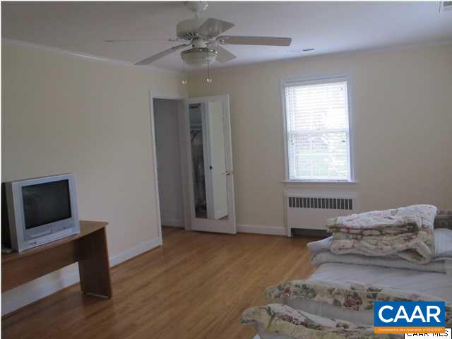 2103 Morris Road Charlottesville, VA 22903 - Photo 21 of 32 a bedroom with a bed and a tv