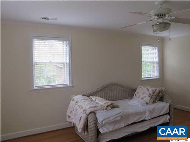 2103 Morris Road Charlottesville, VA 22903 - Photo 22 of 32 a bedroom with a bed and a window