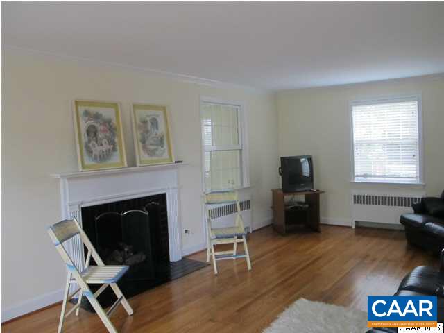 2103 Morris Road Charlottesville, VA 22903 - Photo 6 of 32 a view of a livingroom with furniture and a fireplace