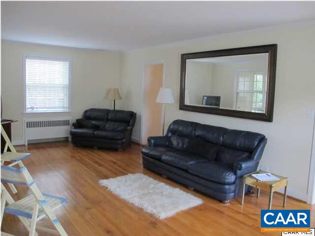 2103 Morris Road Charlottesville, VA 22903 - Photo 10 of 32 a living room with furniture and a mirror