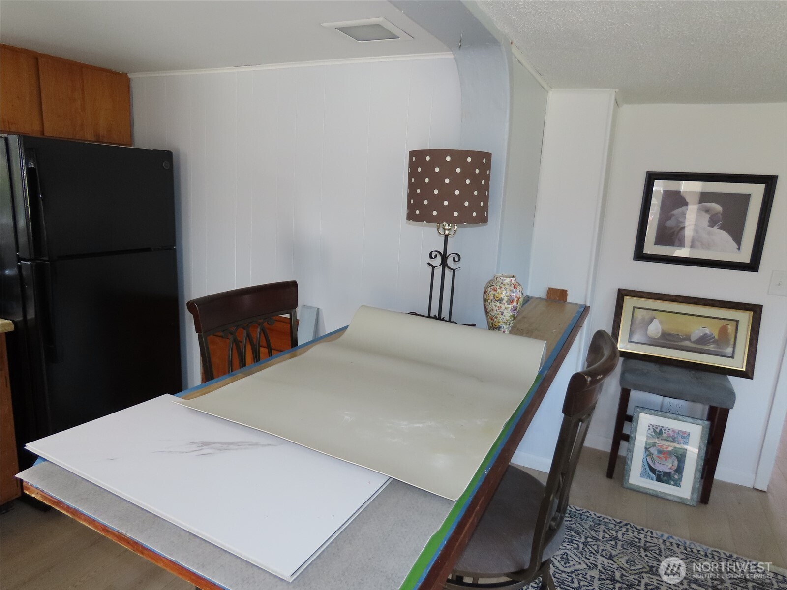 1021 South Forrest Street Westport, WA 98595 - Photo 22 of 29 a room with a bed and a refrigerator