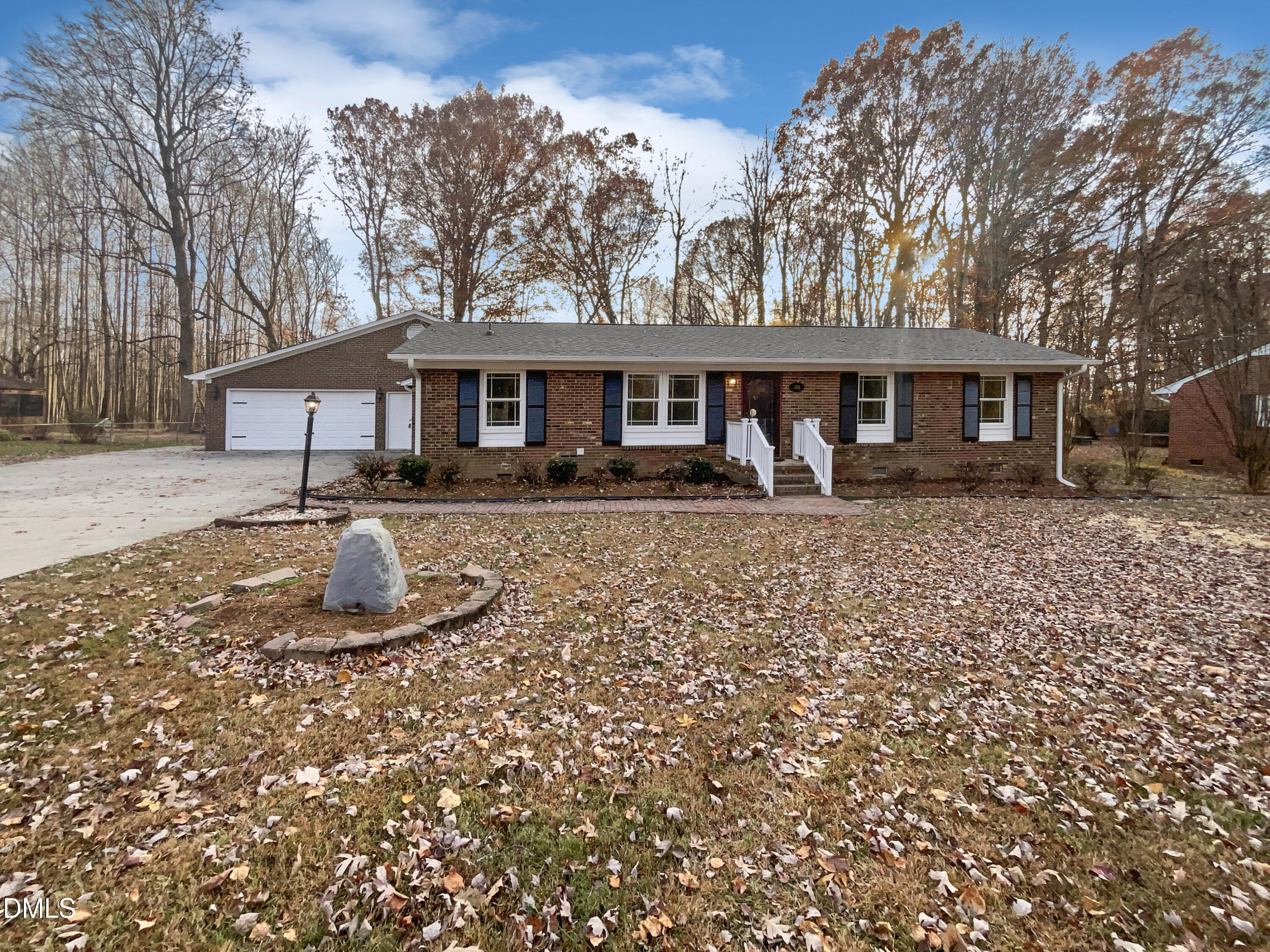 106 Foust Road Mebane, NC 27302 - Photo 1 of 18 front view of a house with a yard