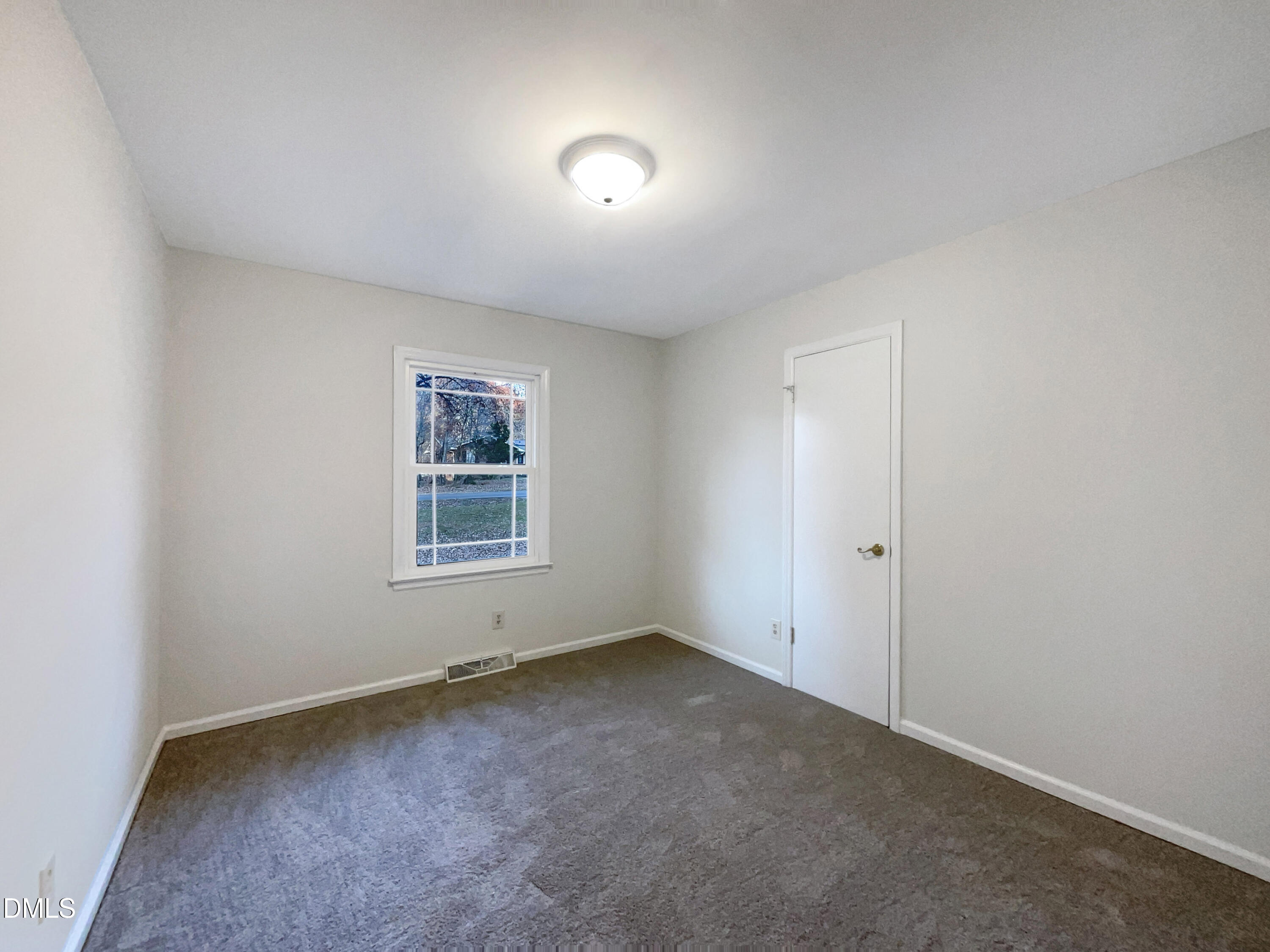 106 Foust Road Mebane, NC 27302 - Photo 13 of 18 a view of an empty room with a window