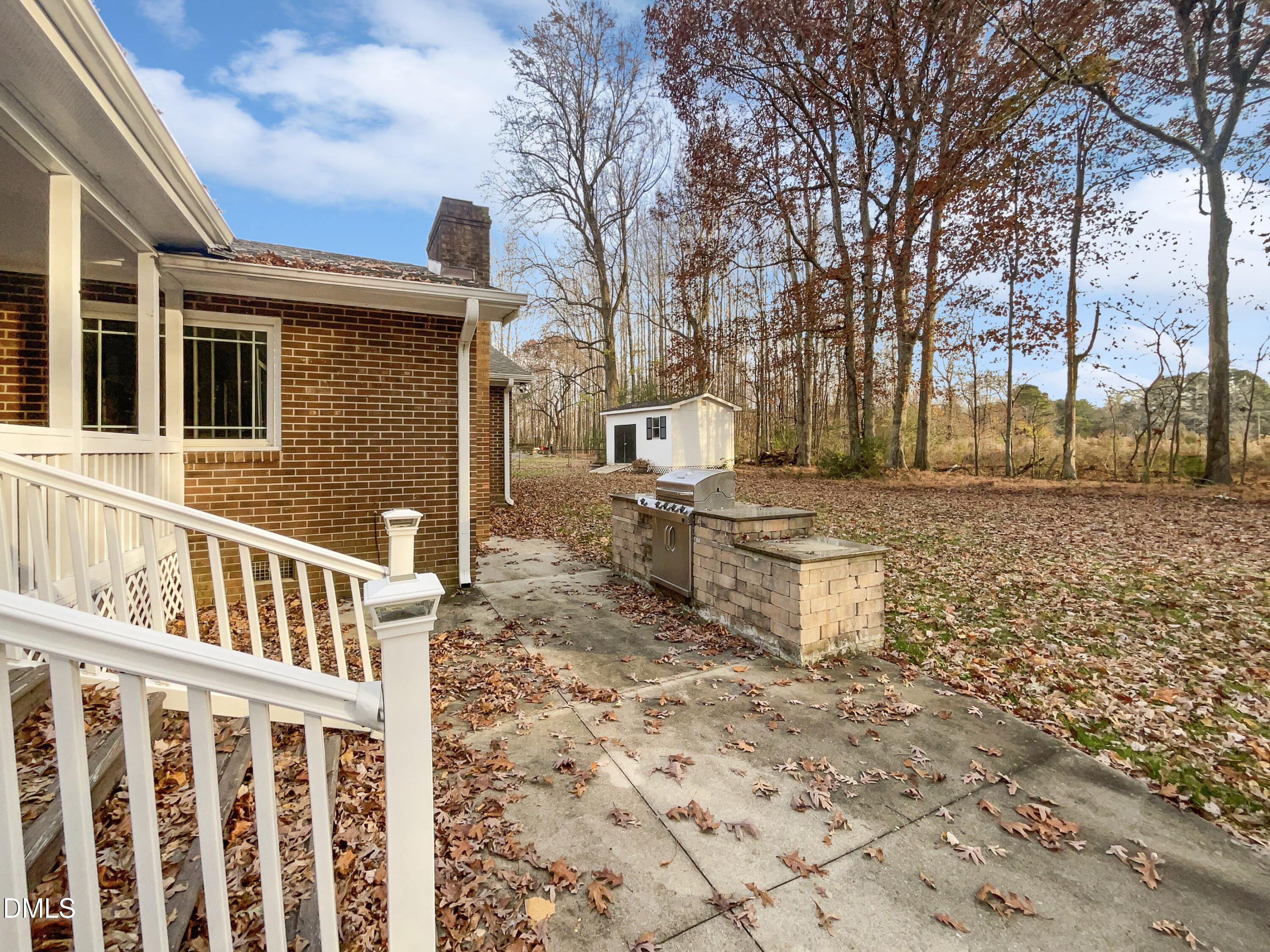 106 Foust Road Mebane, NC 27302 - Photo 17 of 18 a front view of a house with a yard