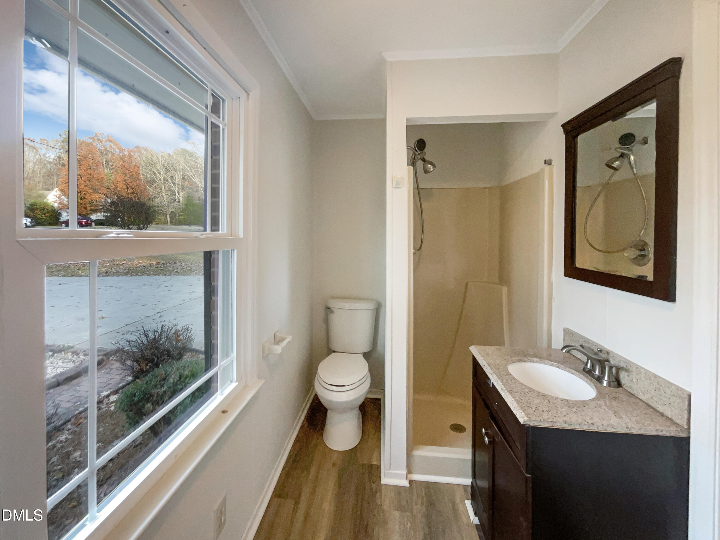 106 Foust Road Mebane, NC 27302 - Photo 6 of 18 a bathroom with a granite countertop sink toilet and a large mirror