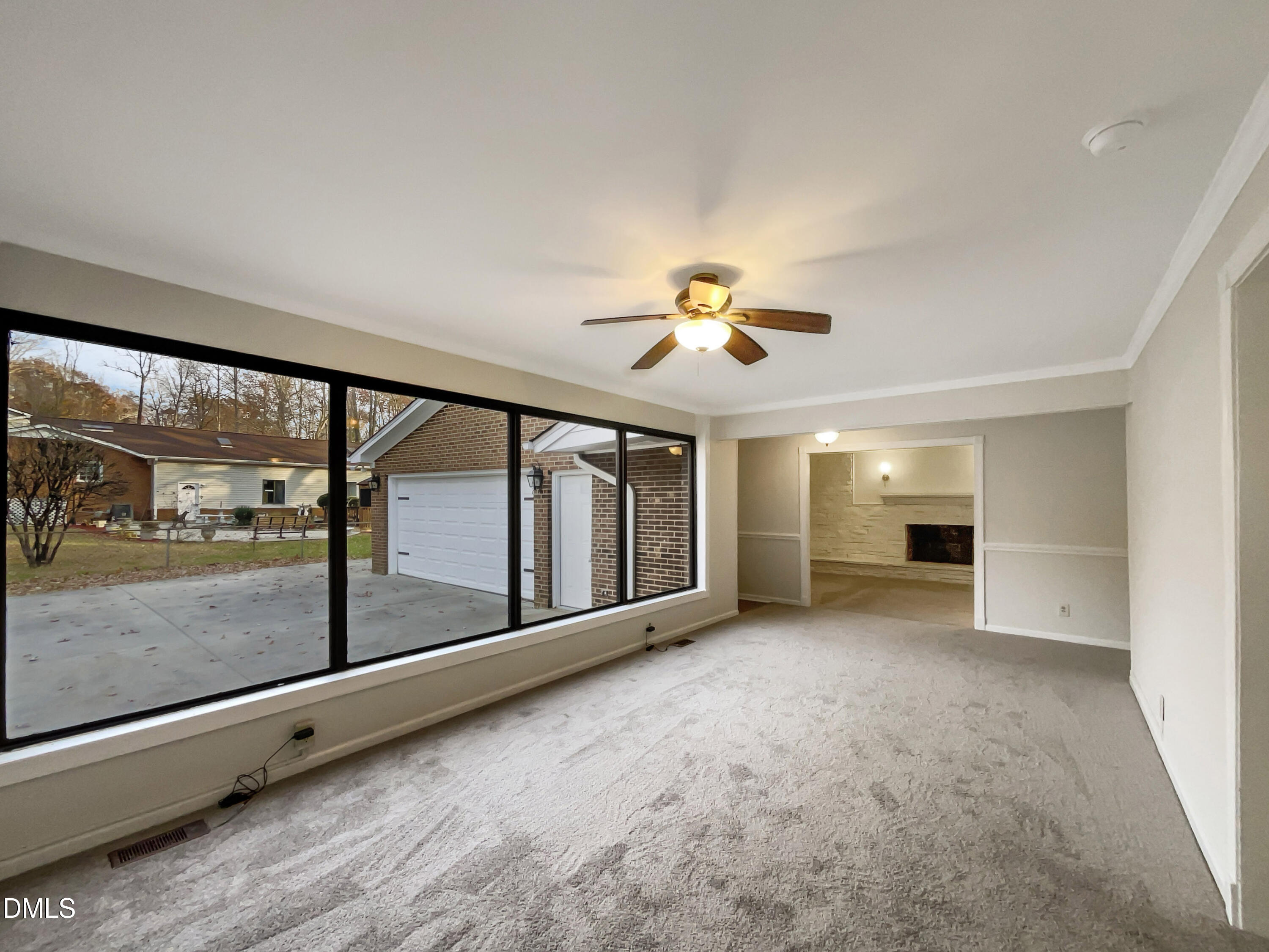 106 Foust Road Mebane, NC 27302 - Photo 9 of 18 a view of an empty room with a balcony