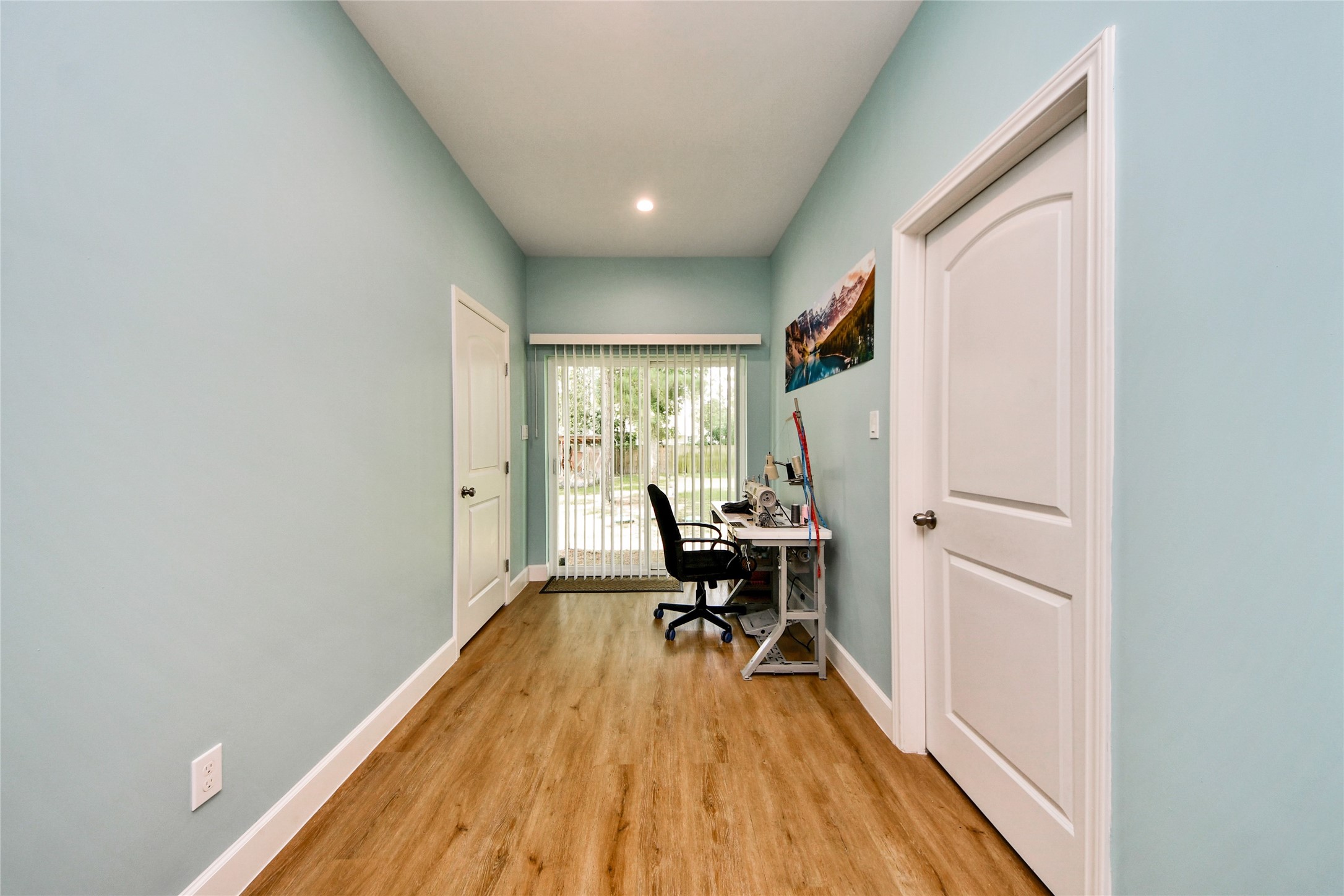 12128 County Road Cleveland, TX 77327 - Photo 13 of 27 a view of a livingroom with wooden floor and furniture