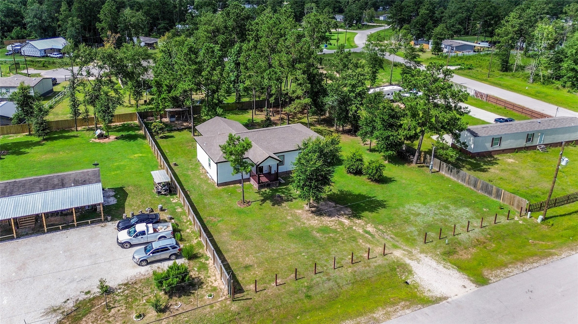 12128 County Road Cleveland, TX 77327 - Photo 26 of 27 a view of an outdoor space