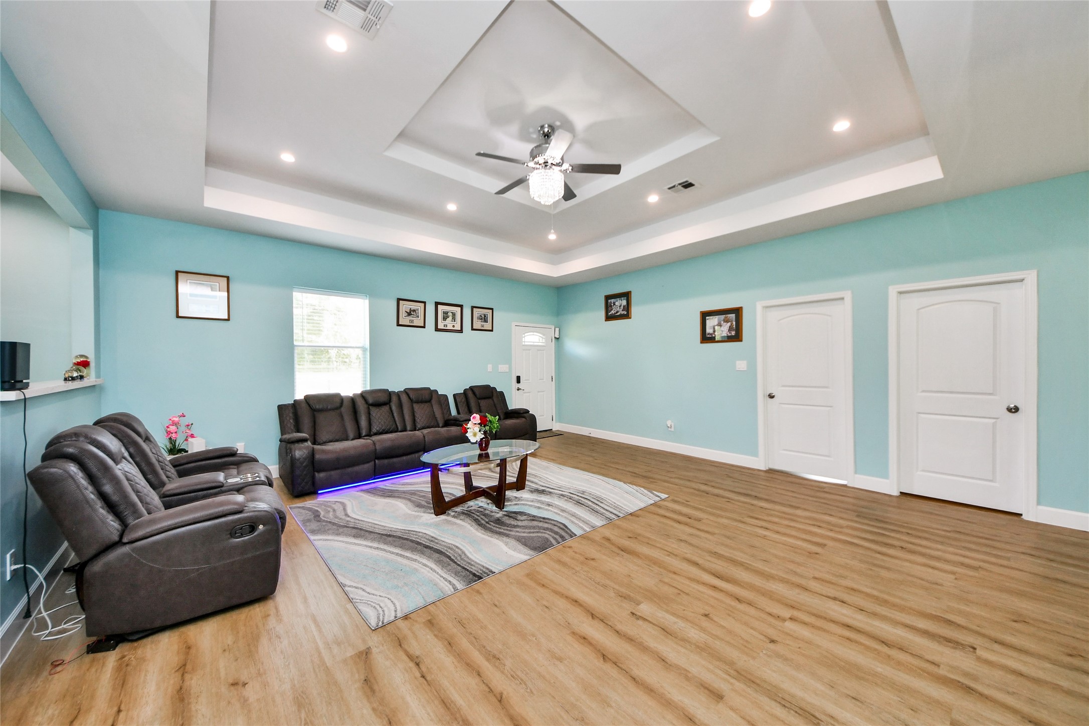 12128 County Road Cleveland, TX 77327 - Photo 6 of 27 a living room with furniture and a ceiling fan