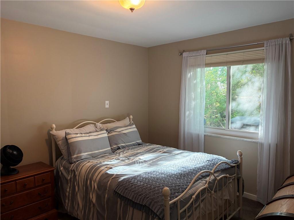 359 Dorseyville Road Pittsburgh, PA 15215 - Photo 16 of 29 a bedroom with a bed and a window