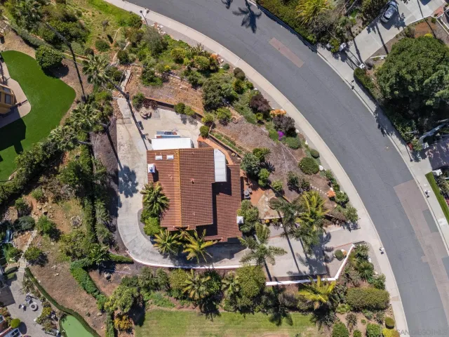 a kitchen with stainless steel appliances granite countertop a stove and a refrigerator