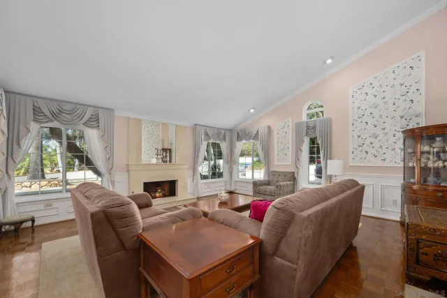 a bedroom with a bed and a large mirror on dresser