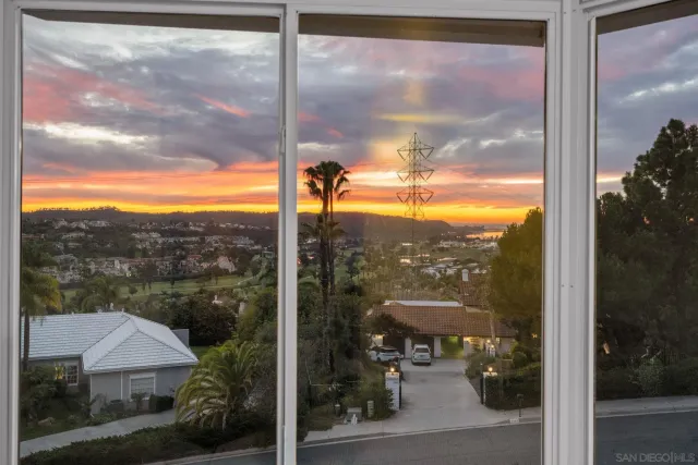 a view of a city with mountains in the background