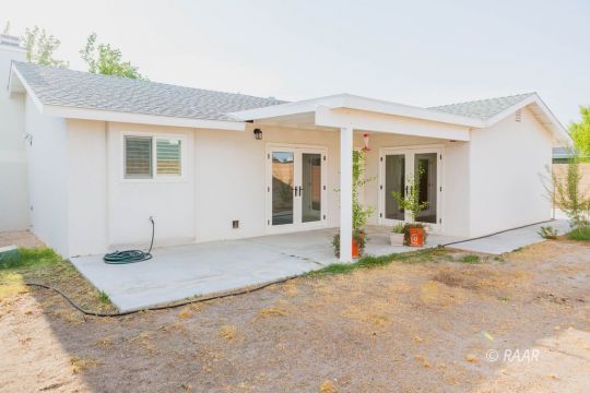 432 Ashton Street Ridgecrest, CA 93555 - Photo 29 of 31 a view of a house with a house and yard