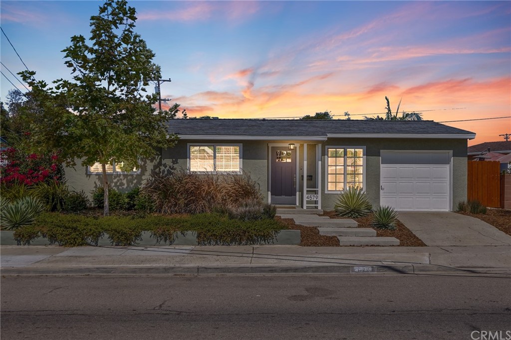 4579 Rolfe Road San Diego, CA 92117 - Photo 1 of 1 a front view of a house with a yard