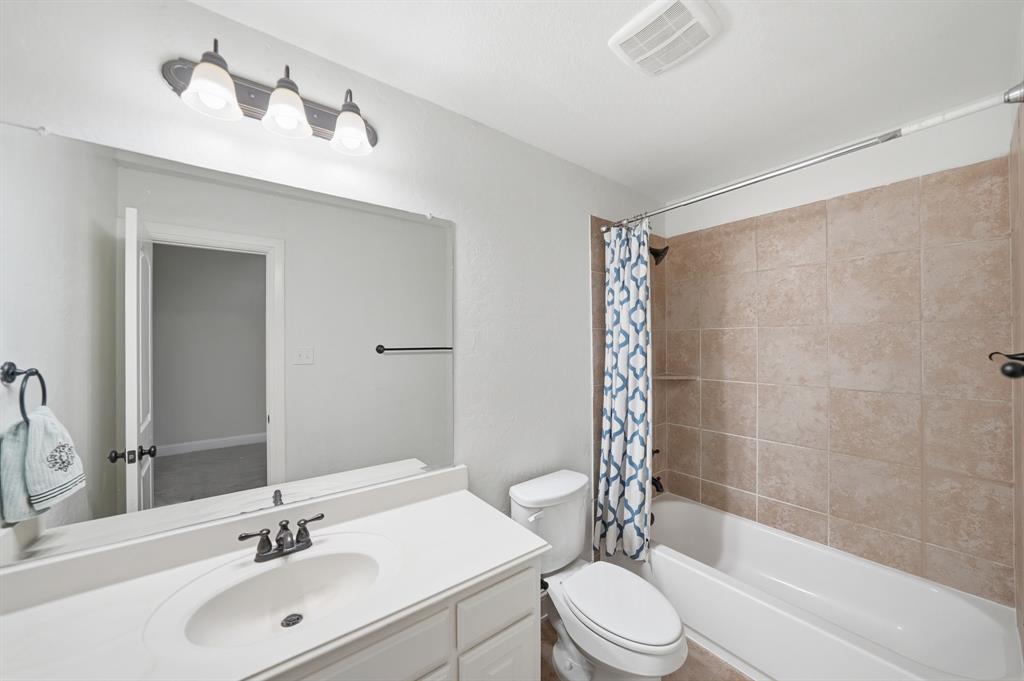 624 Sorrell Road McKinney, TX 75072 - Photo 18 of 28 a bathroom with a sink a toilet and shower
