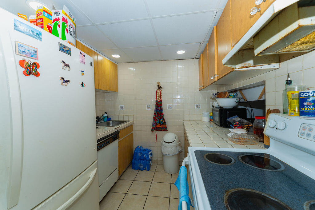 777 Southwest 9th Avenue, Unit 409 Miami, FL 33130 - Photo 11 of 32 a room with storage and utility