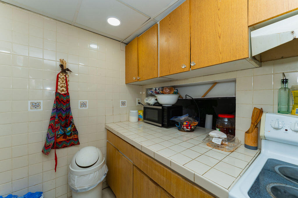 777 Southwest 9th Avenue, Unit 409 Miami, FL 33130 - Photo 13 of 32 a utility room with dryer and washer