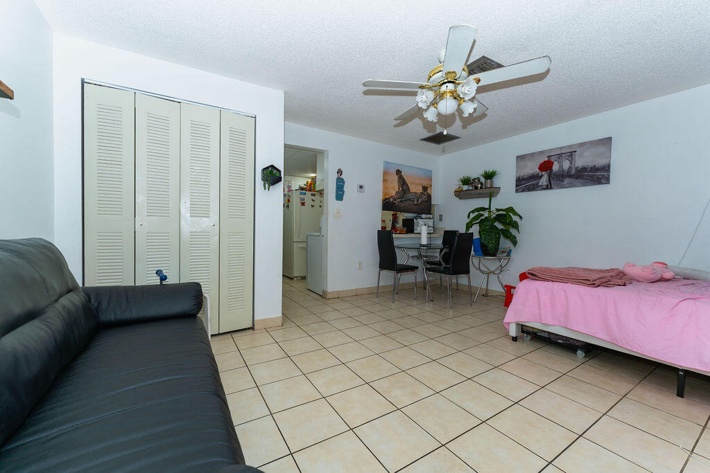 777 Southwest 9th Avenue, Unit 409 Miami, FL 33130 - Photo 20 of 32 a living room with furniture