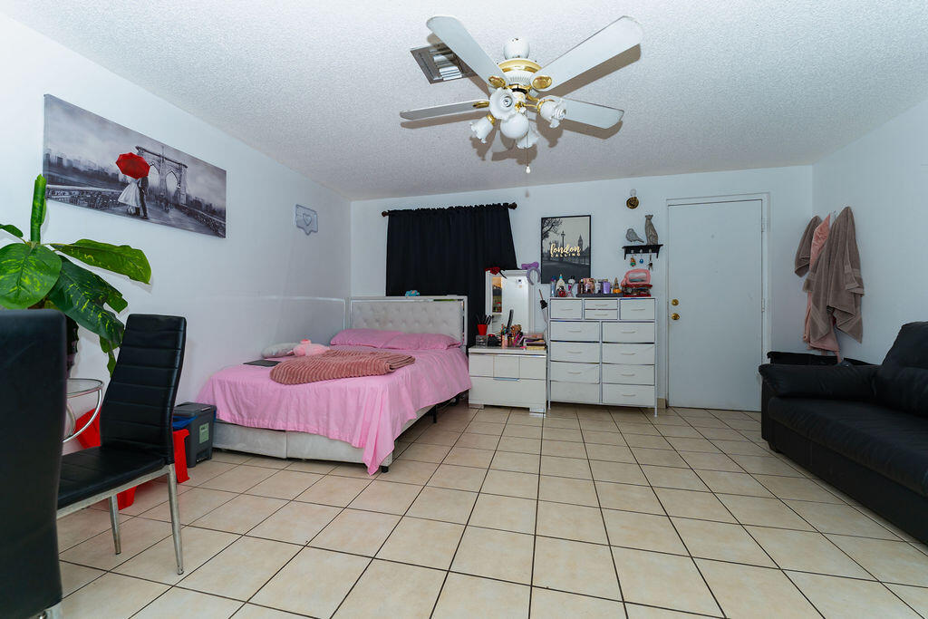 777 Southwest 9th Avenue, Unit 409 Miami, FL 33130 - Photo 22 of 32 a living room with furniture