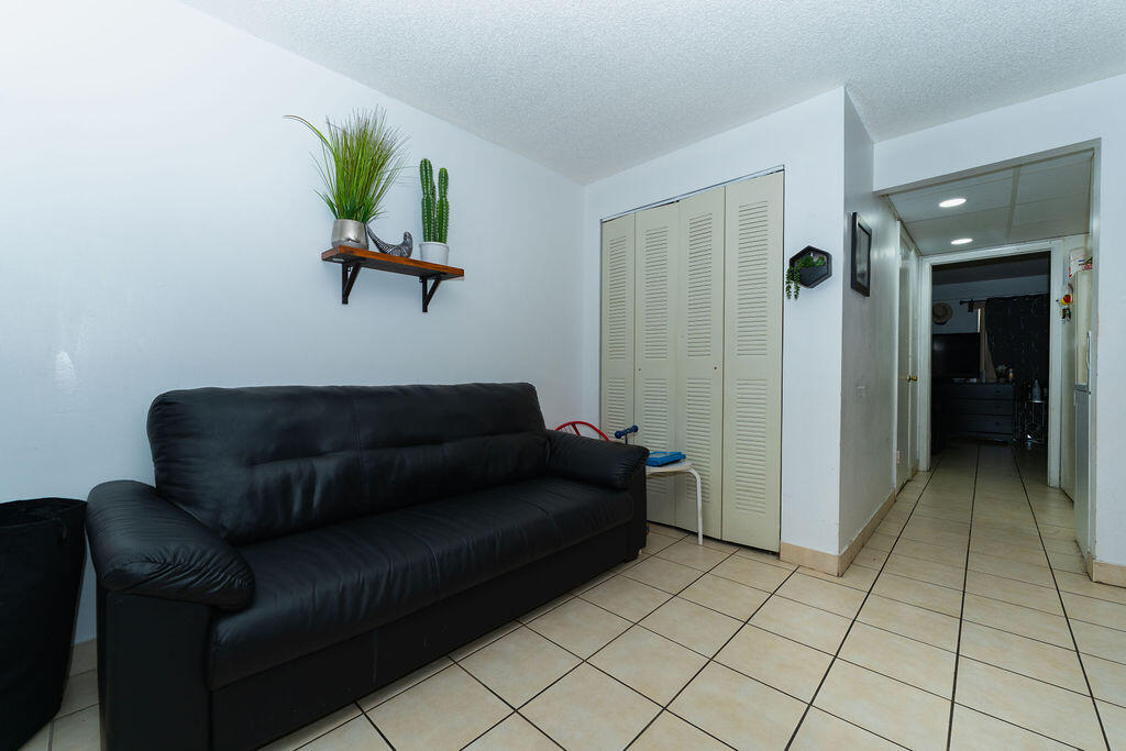 777 Southwest 9th Avenue, Unit 409 Miami, FL 33130 - Photo 25 of 32 a living room with furniture