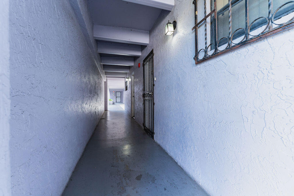 777 Southwest 9th Avenue, Unit 409 Miami, FL 33130 - Photo 26 of 32 a view of a hallway