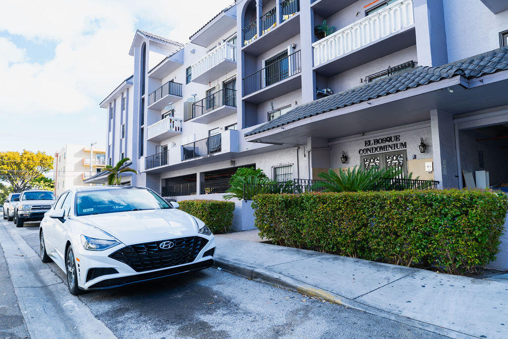 777 Southwest 9th Avenue, Unit 409 Miami, FL 33130 - Photo 31 of 32 a car parked in front of a brick building