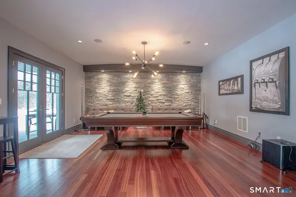 a view of a room with furniture window and wooden floor