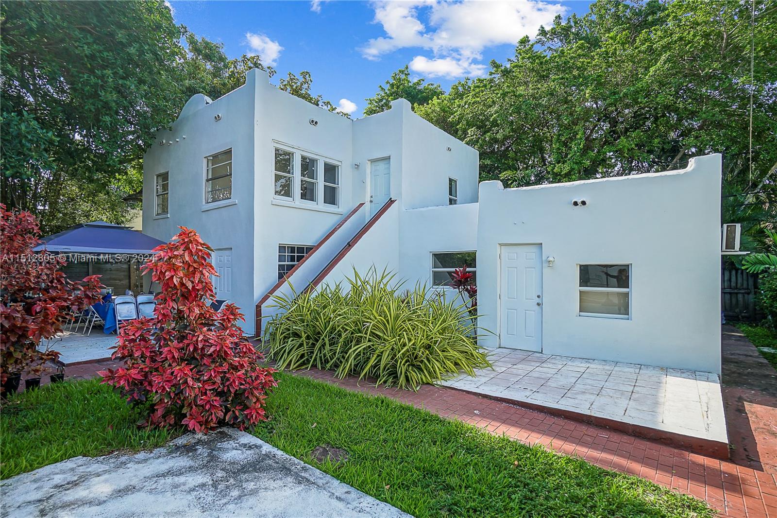 1924 Southwest 9th Street Miami, FL 33135 - Photo 16 of 23 a front view of a house with garden