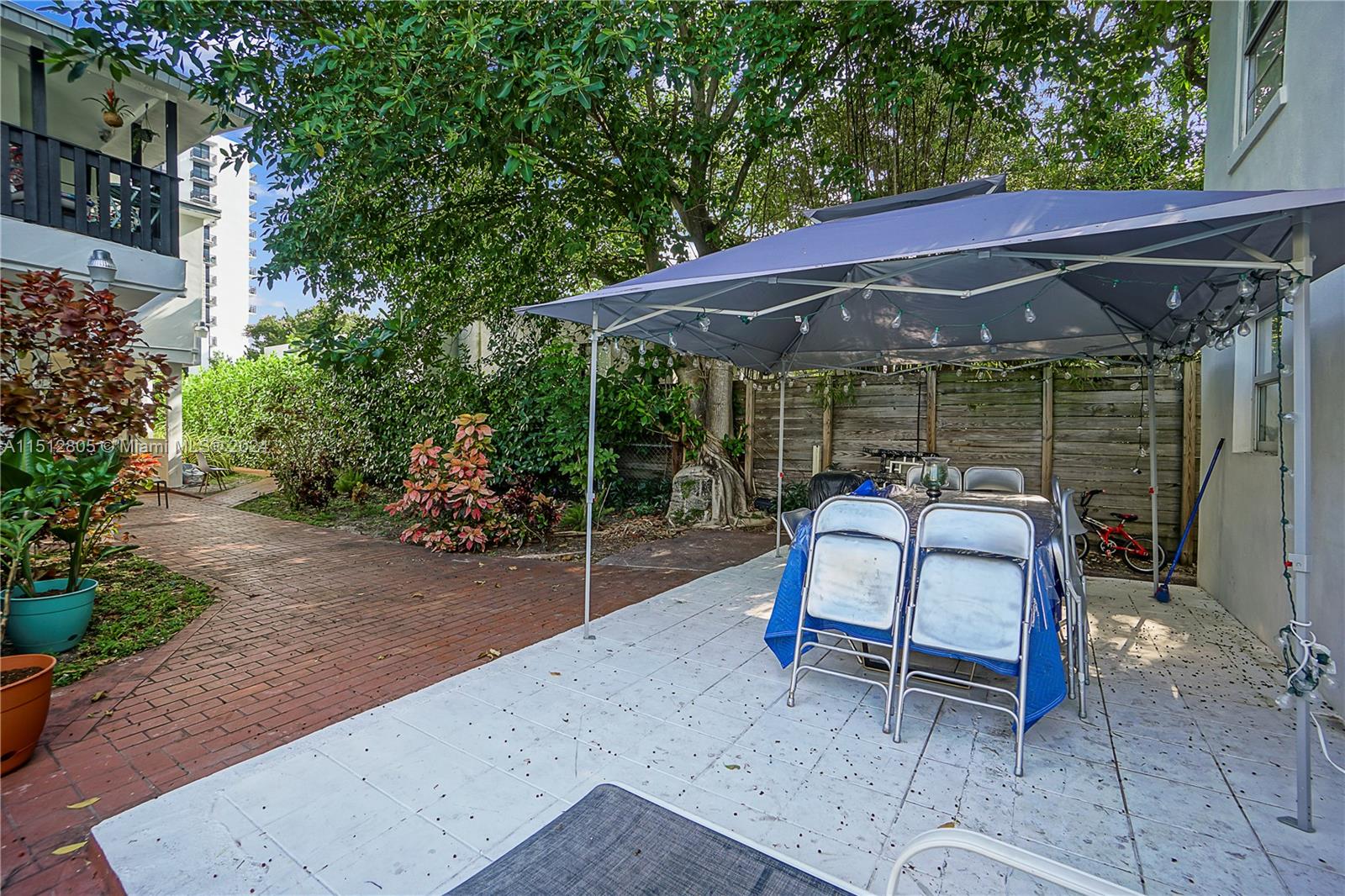 1924 Southwest 9th Street Miami, FL 33135 - Photo 18 of 23 a wooden bench sitting in front of a building