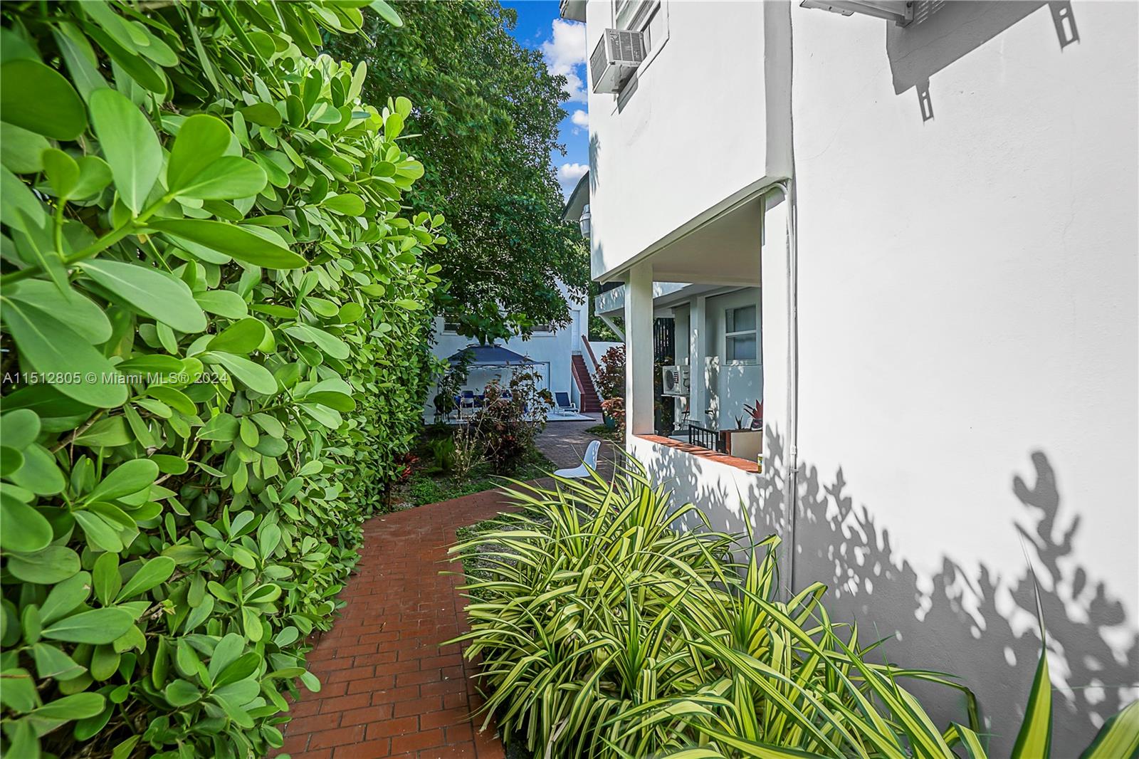 1924 Southwest 9th Street Miami, FL 33135 - Photo 21 of 23 a backyard of a house with table and chairs