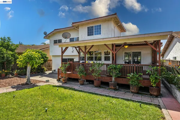 a house view with a garden space