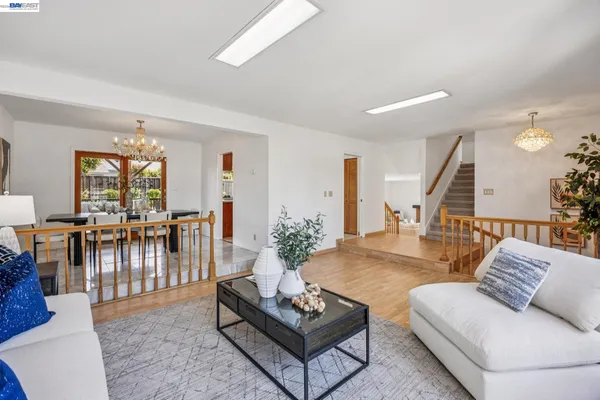 a living room with furniture and a table
