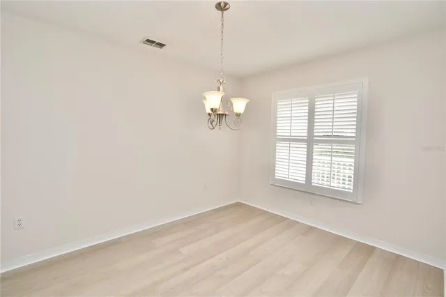 a view of a kitchen with a sink