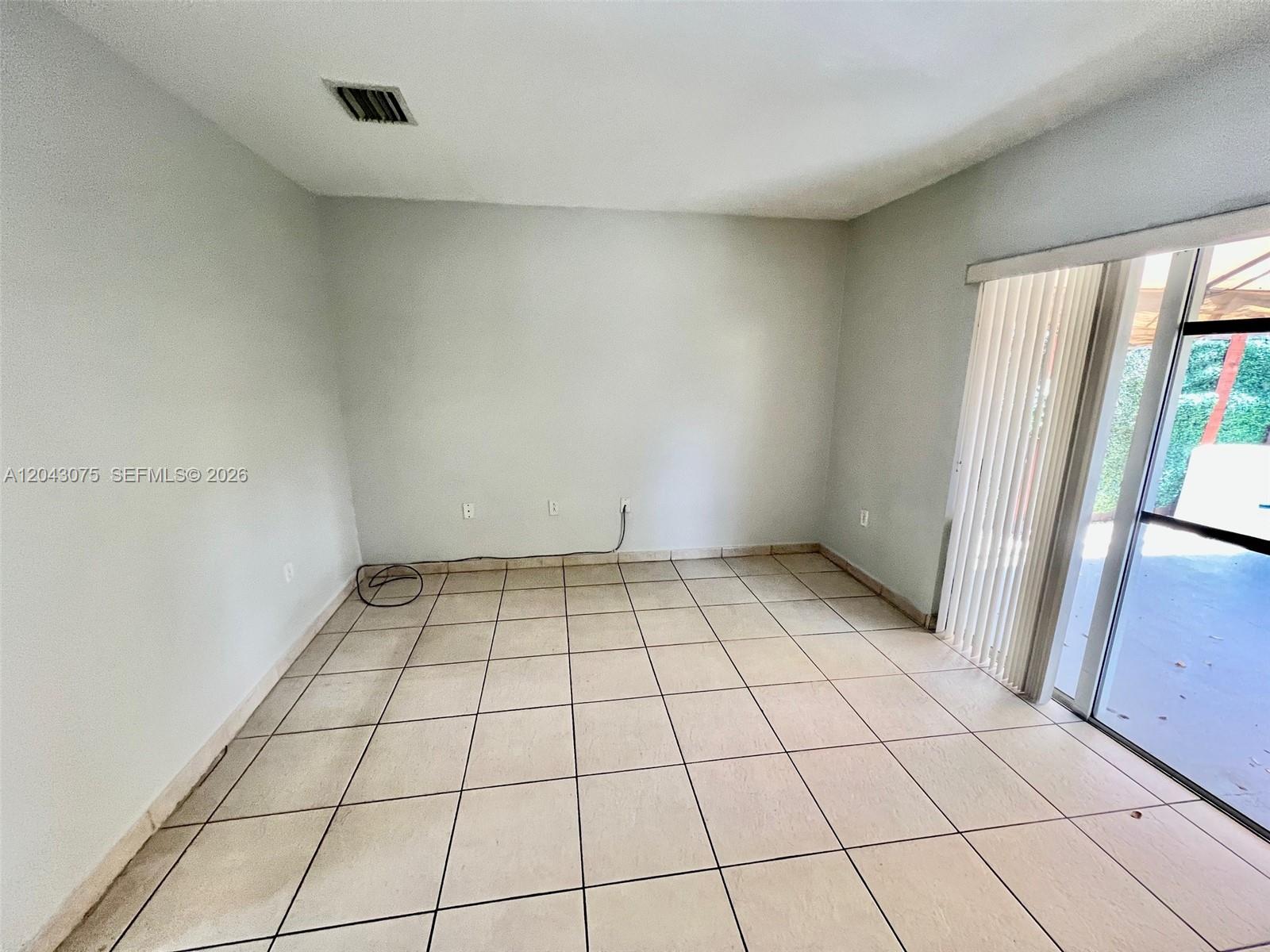 6975 Northwest 173rd Drive, Unit 2007 Hialeah, FL 33015 - Photo 6 of 14 Family room