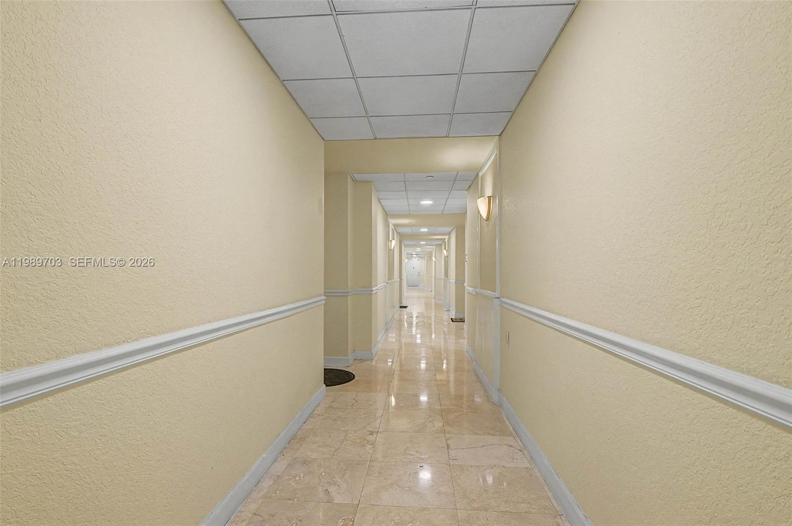 7000 Southwest 80th Street, Unit 103 Miami, FL 33143 - Photo 15 of 16 a view of a hallway