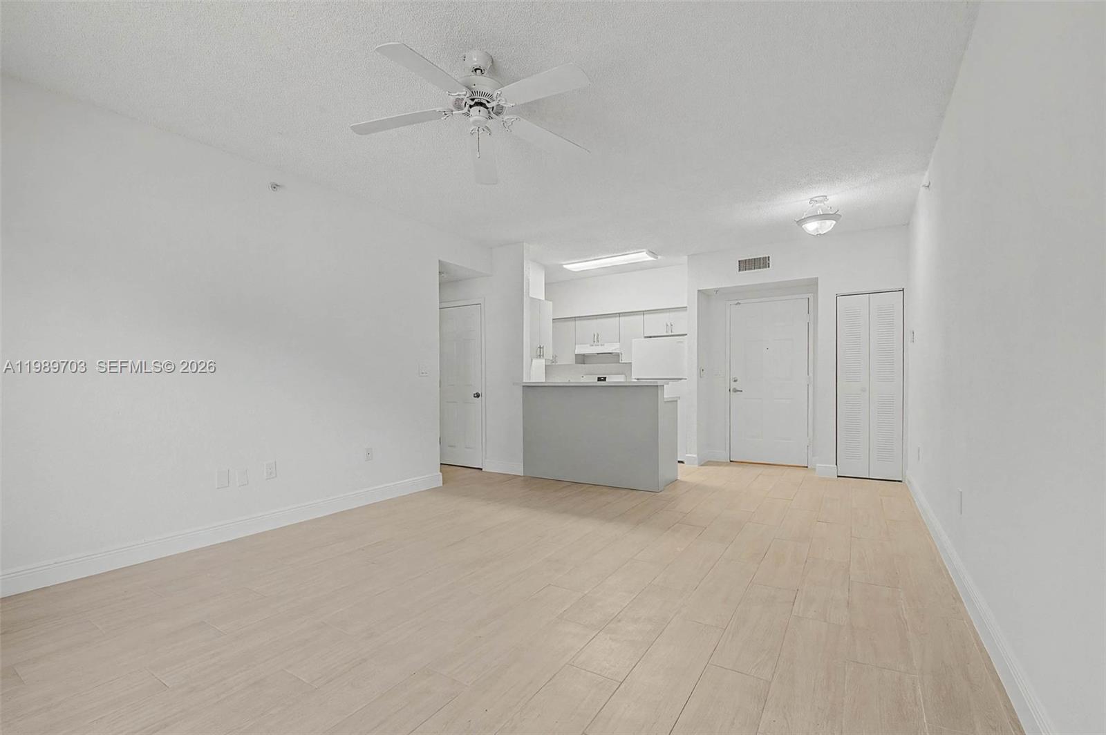 7000 Southwest 80th Street, Unit 103 Miami, FL 33143 - Photo 3 of 16 a view of a kitchen with a sink